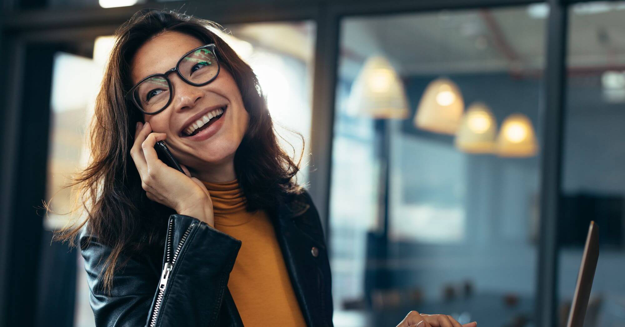 Woman on the phone with Pharma Hub Services