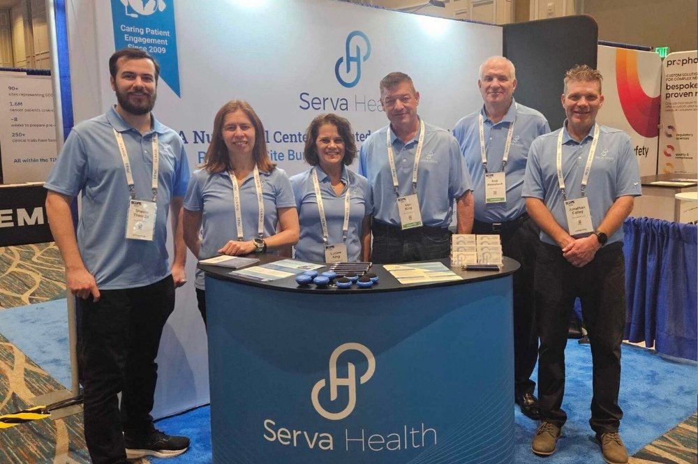 Serva Health team at SCOPE 2026 conference booth showcasing clinical research solutions