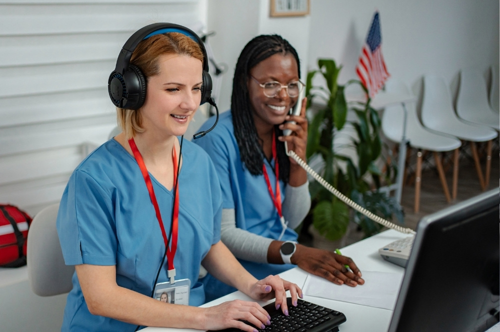 Clinical trials site support nurses coordinating patient follow up and scheduling tasks at research site